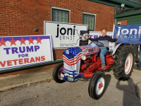 Me on the Trump Tractor.png